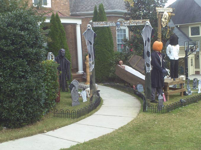 Day View of Halloween Graveyard Entrance Banner also showing Gallows  Executioner and Corpse in Coffin