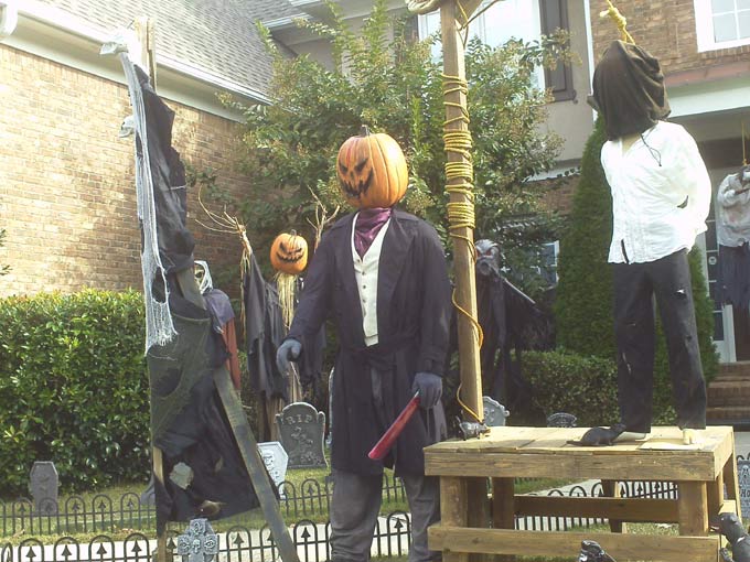 Day View of Gallows, Executioner with Scarecrow in Background