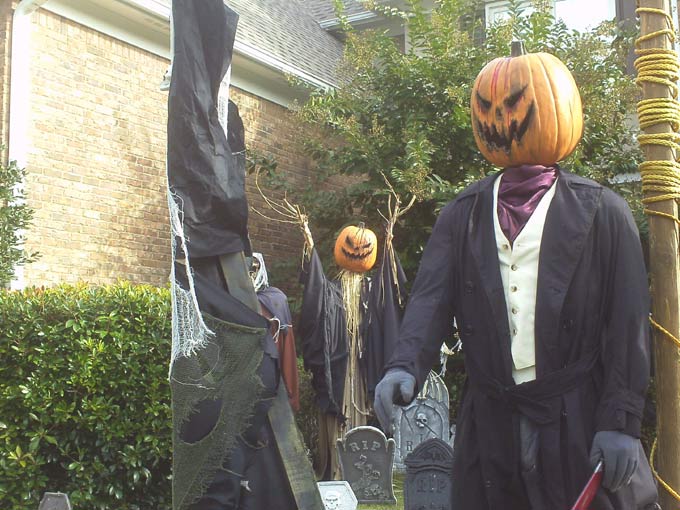 Close-up of Executioner with Scarecrow in Background